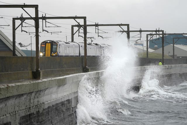 Waves crash against the sea wall at Saltcoats in North Ayrshire before Storm Dudley hits the north of England/southern Scotland from Wednesday night into Thursday morning, closely followed by Storm Eunice, which will bring strong winds and the possibility of snow on Friday 