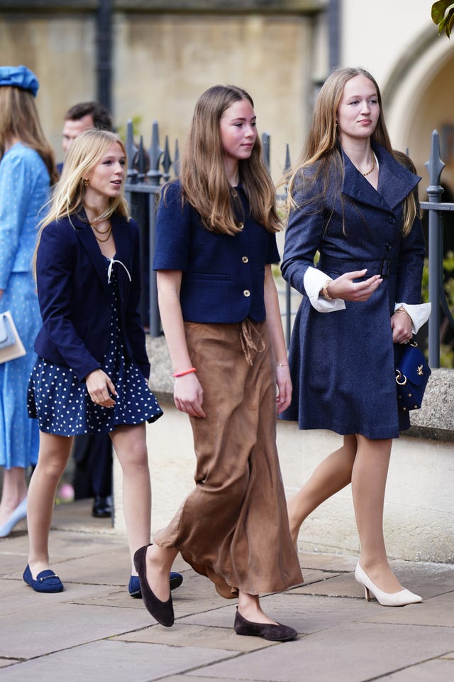 Isla Phillips, Harriet Sperling&rsquo;s daughter Georgina and Savannah Phillips walking outside