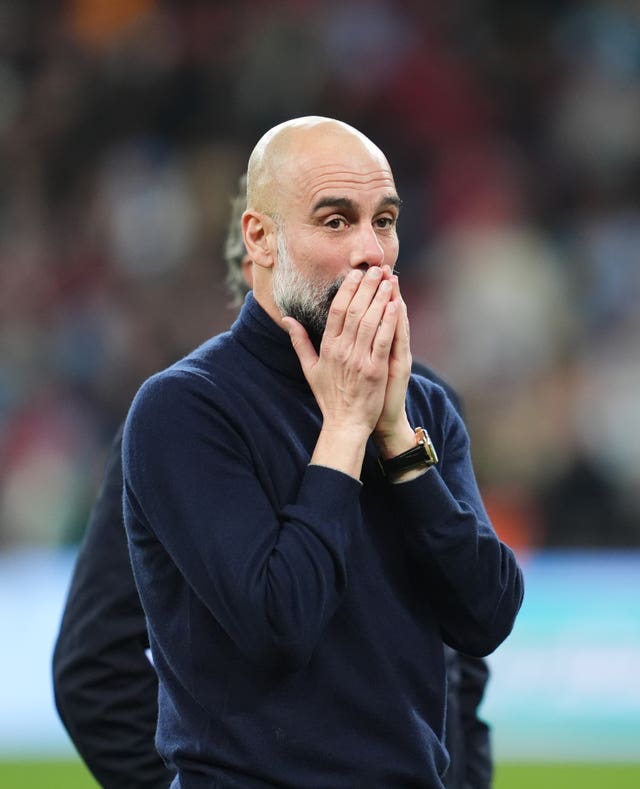 Manchester City manager Pep Guardiola at the final whistle after Carabao Cup final victory over Arsenal