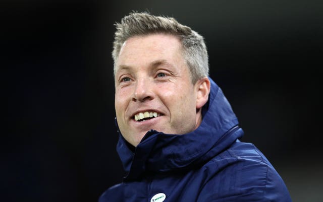 Neil Harris'' side boosted their play-off hopes