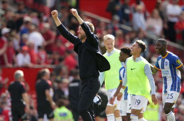 Graham Potter salutes Brighton's fans after his side's win at Manchester United on the opening day of the season