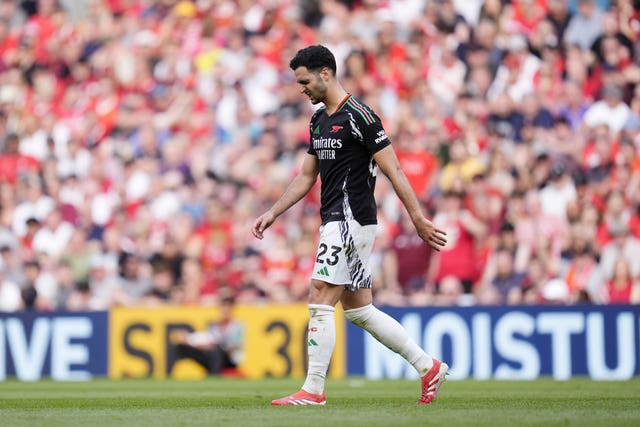 Mikel Merino leaves the pitch after being shown a red card