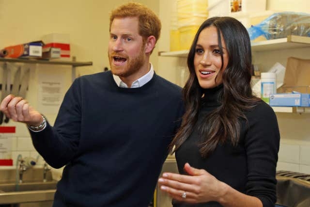 Prince Harry and Meghan Markle during a visit to Social Bite (Owen Humphreys/PA)