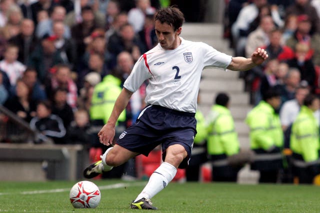 Gary Neville in action for England (Phil Noble/PA).