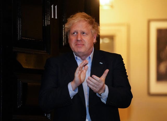 Prime Minister Boris Johnson clapping outside 11 Downing Street in London to salute local heroes last Thursday 