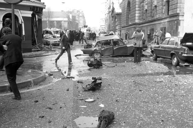 Wrecked cars and debris at the scene after the Old Bailey bomb explosion in London