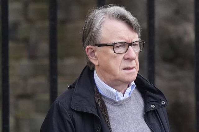 Headshot of Lord Peter Mandelson walking outside