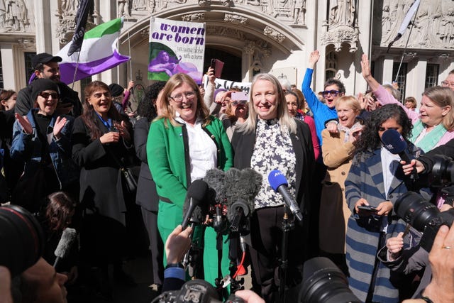 Susan smith (centre left) and Marion Calder (centre right) co-directors of For Women Scotland with campaigners celebrate outside the Supreme Court in London