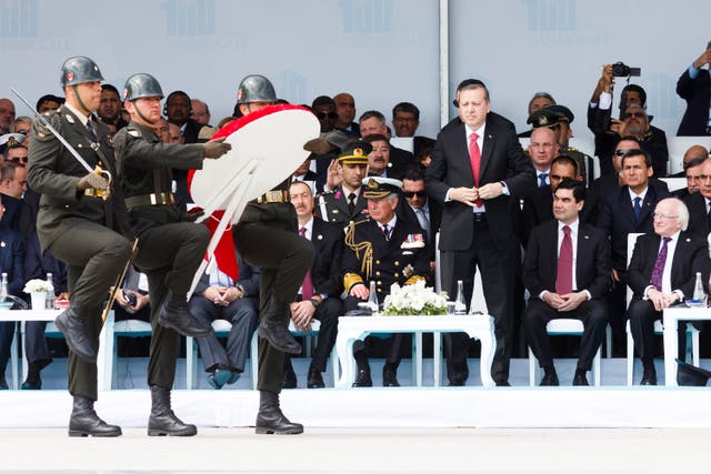 The then-Prince of Wales and Turkish President Recep Tayyip Erdogan join other dignitaries as they attend an international service of remembrance at the Abide memorial in Turkey in 2015