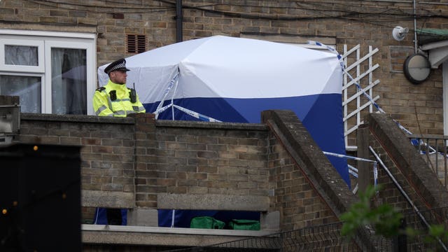 A cordon and forensic tent  in Lord Warwick Street 