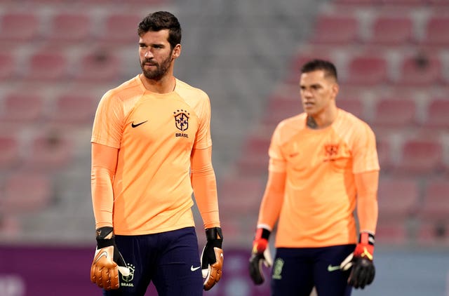 Brazil goalkeepers Alisson (left) and Ederson h
