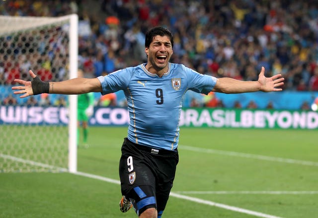 Luis Suarez disgraced himself at the 2014 World Cup after another biting incident 