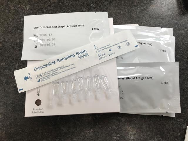 A package of seven NHS Test and Trace COVID-19 self-testing kits (PA/Zoe Linkson)