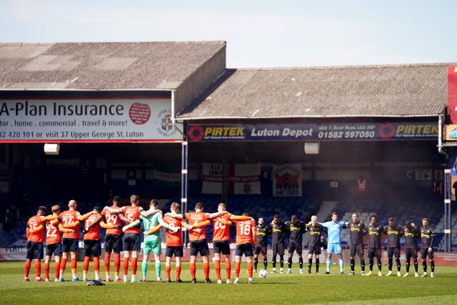 Ahead of their clash, local rivals Luton and Watford stood together in memory