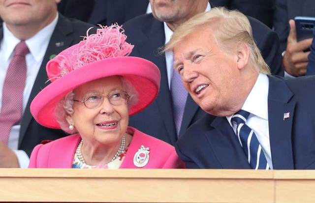 Donald Trump with the Queen on a previous visit to the UK 