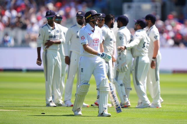 Jasprit Bumrah (centre) kept England in check with a five-wicket haul 