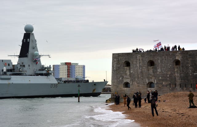 HMS Defender returns to base