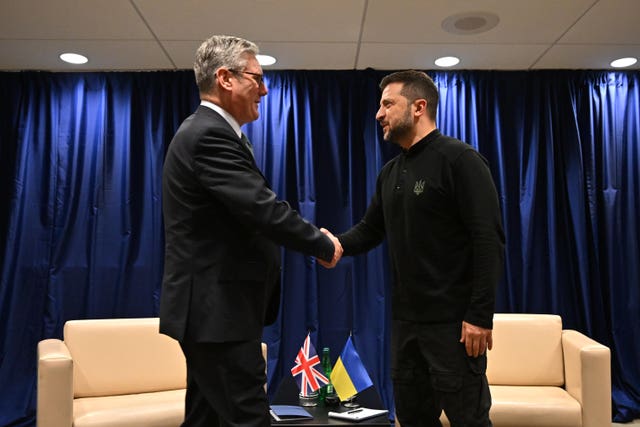 The Prime Minister shaking hands with Ukrainian president Volodymyr Zelensky 