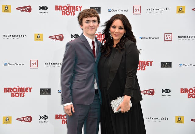 Brenock O’Connor and Martine McCutcheon attending The Bromley Boys World Premiere held at Wembley Stadium in London (Matt Crossick/PA)