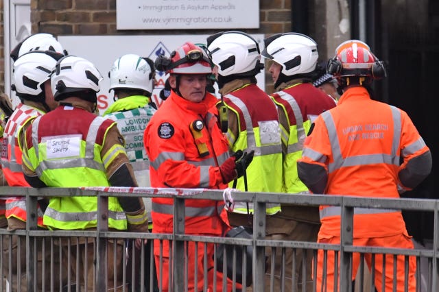 Emergency services at the scene (Dominic Lipinski/PA)