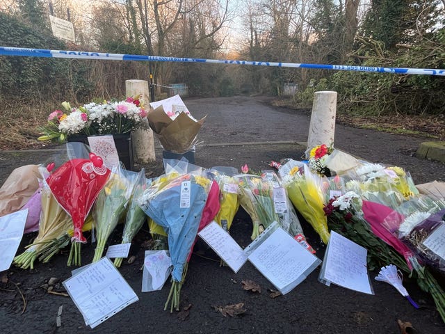 Flowers left in tribute to Leo near the scene