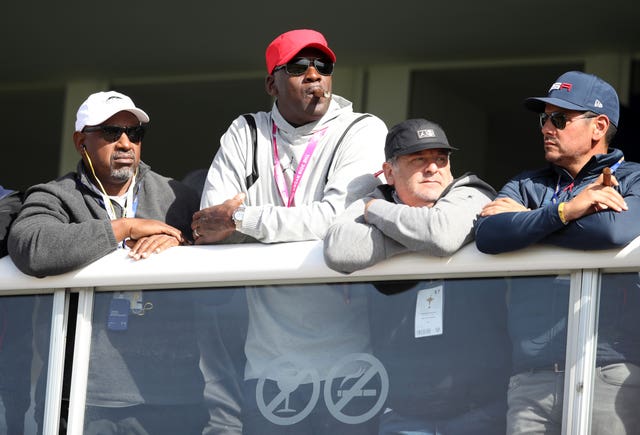 Former basketball star Michael Jordan watches the action in Paris