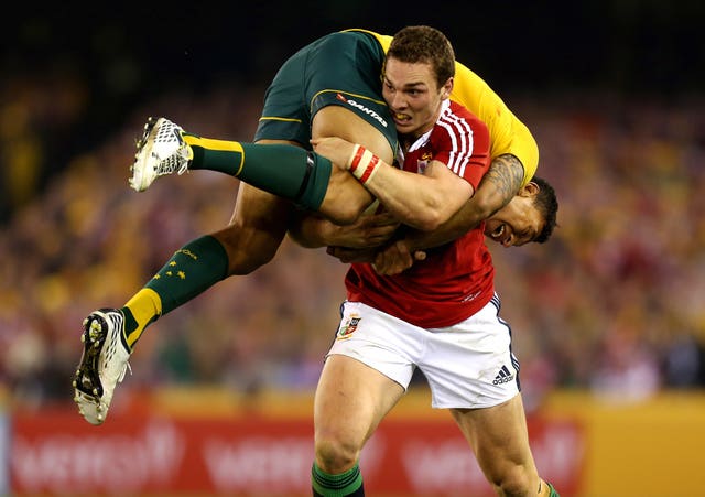 George North carries Israel Falaou on his shoulder after picking him up in a tackle during the British and Irish Lions 2013 tour of Australia. Warren Gatland's team lost 16-15 at the Etihad Stadium in Melbourne but won the Test series 2-1