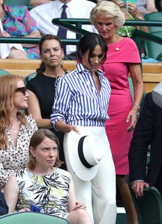 The Duchess of Sussex in the royal box on centre court on day twelve of the Wimbledon Championships at the All England Lawn Tennis and Croquet Club, Wimbledon.