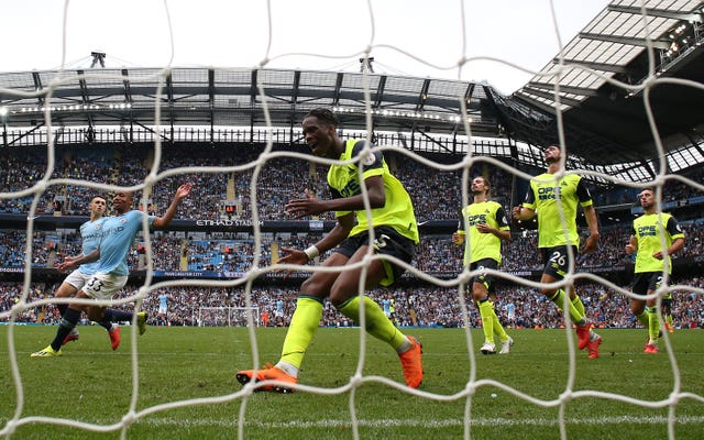 Huddersfield's miserable afternoon at the Etihad Stadium was complete when Terence Kongolo scored an own goal