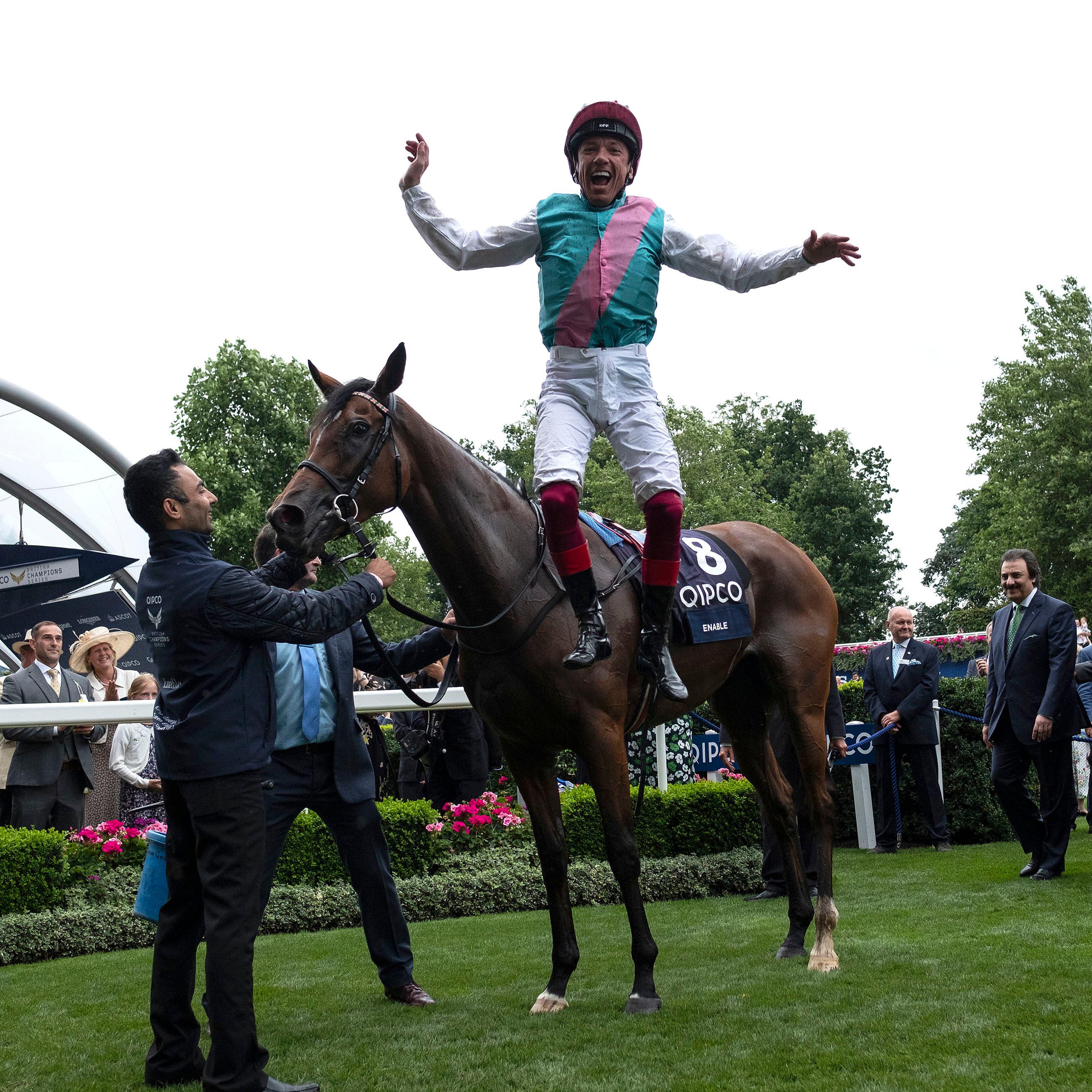 Frankie Dettori jumps from Enable after winning the King George