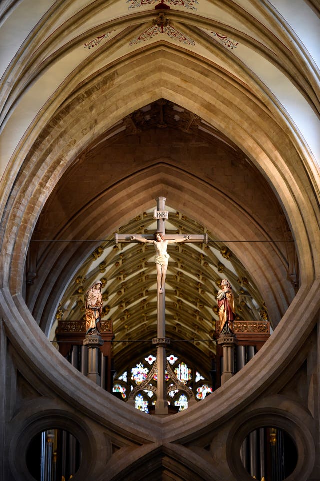 A crucifix in the scissor arches of Wells Cathedral (Andrew Matthews/PA)