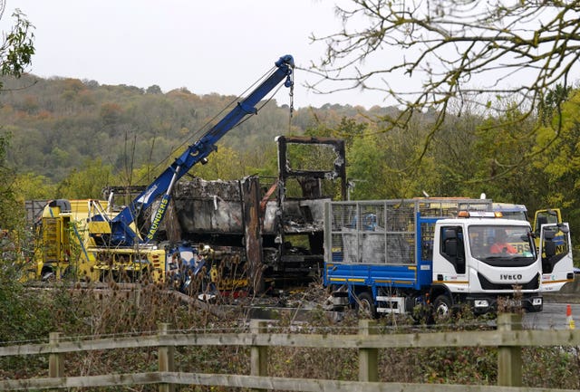 Recovery services at the scene on the M25 motorway between Junction 5 in Kent and Junction 6 in Surrey after a lorry fire