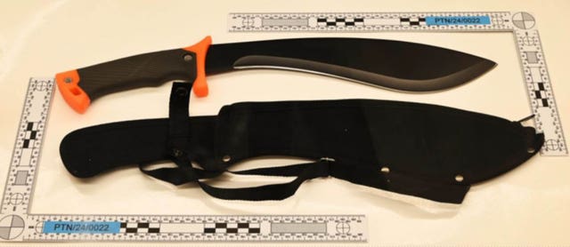 Court picture of a large knife seized at the killer's home