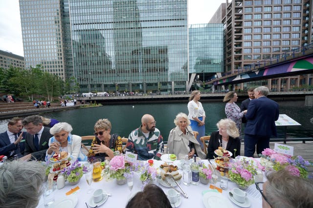 Queen Camilla, Patron of The Big Lunch, joins members of the local community at a Big Lunch in Canary Wharf, east London,