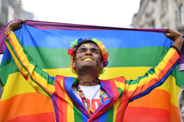 A reveller ahead of the Pride in London Parade in central London