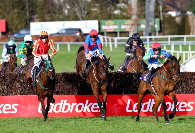 Top Ville Ben (left), The Goffer (centre) and Glamorgan Duke (right) jump the last in the Bulmers Leopardstown Handicap Chase at Leopardstown on Day two of the Dublin Racing Festival (