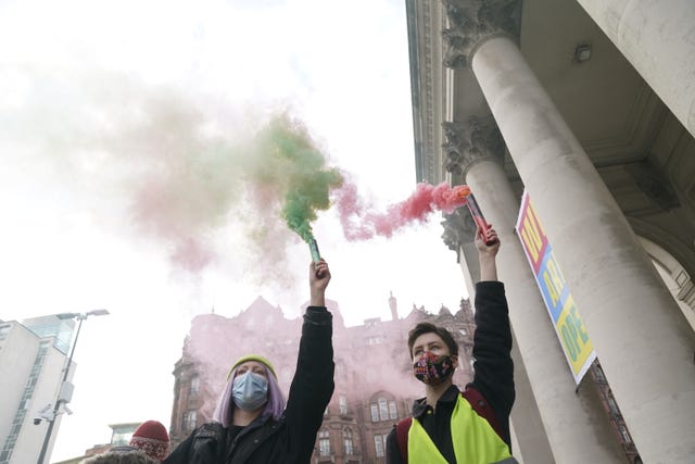 Demonstrators hold smoke flares during a ‘Kill The Bill’ protest (Danny Lawson/PA)