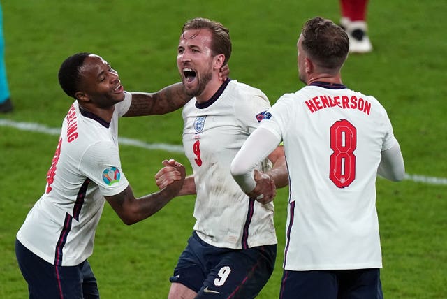 England's Raheem Sterling, Harry Kane and Jordan Henderson celebrate winning the Euro 2020 semi-final match at Wembley Stadium on July 7 2021