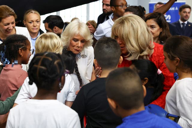 The Queen and Brigitte Macron meet young athletes in Saint-Denis