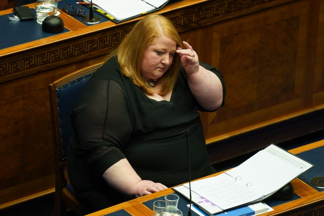 Alliance Party justice minister Naomi Long before speaking in the Northern Ireland Assembly chamber at Stormont during the delivery of the long-awaited public apology to the victims of historical institutional abuse 