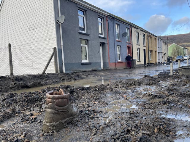 A boot abandoned in mud after the flooding in south Wales