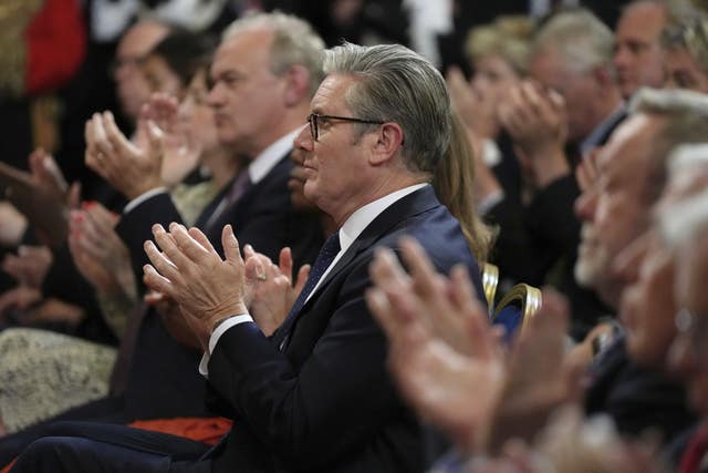 Sir Keir Starmer applauding