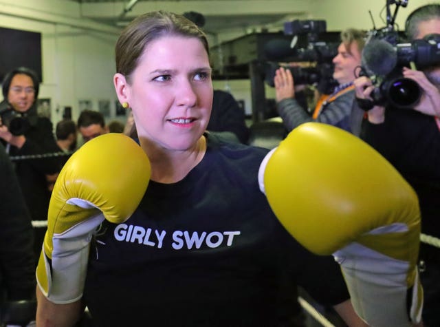 Lib Dems leader Jo Swinson in the boxing ring at Total Boxer, a specialised boxing gym which offers training to young people as a means of keeping them away from violence, in Crouch End, London