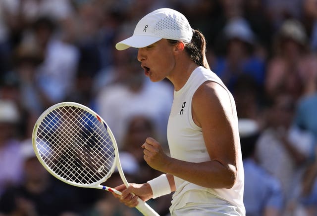 Iga Swiatek celebrates victory over Belinda Bencic