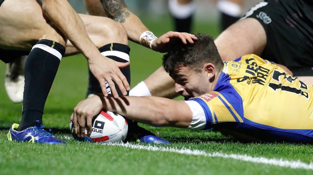 Leeds Rhinos forward Stevie Ward goes over for a try