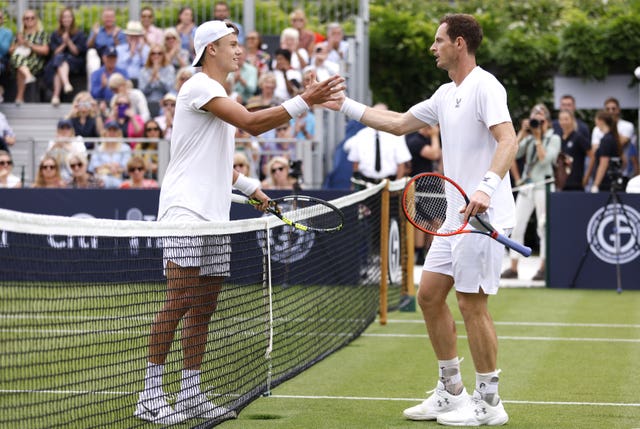 Andy Murray (right) shake hands with Holger Rune following their exhibition clash 