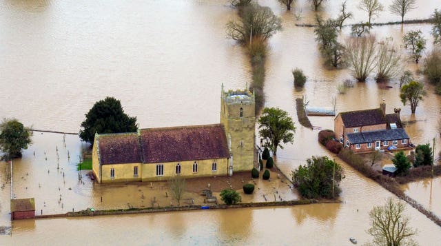 Parishioners at St Michael's Church in Tirley are used to it flooding (Steve Parsons/PA).
