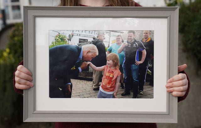 Joe Biden kissing Aoibhinn Brennan's hand in 2016