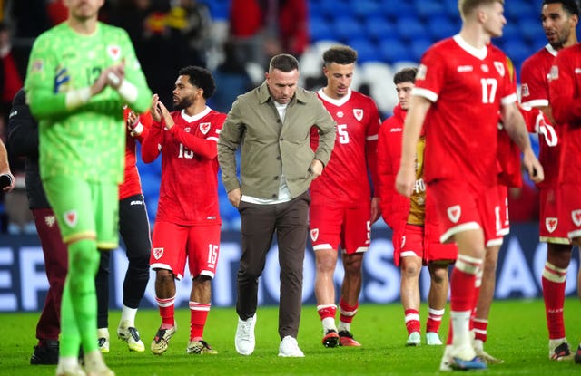Wales head coach Craig Bellamy, centre, looks dejected
