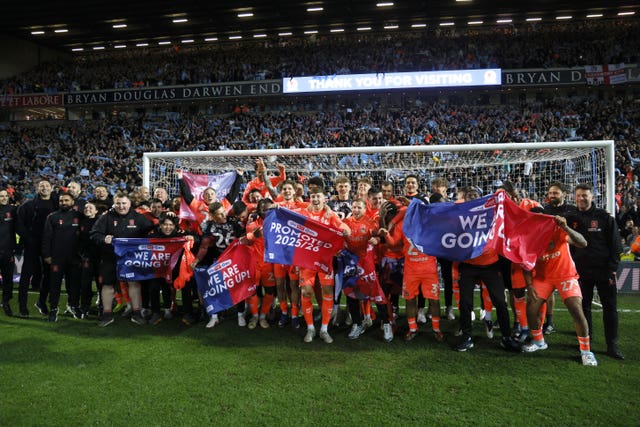 Coventry players celebrate promotion to the Premier League